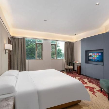 Mizparton Hotel South Qianjin Road Heshan  Bagian luar foto