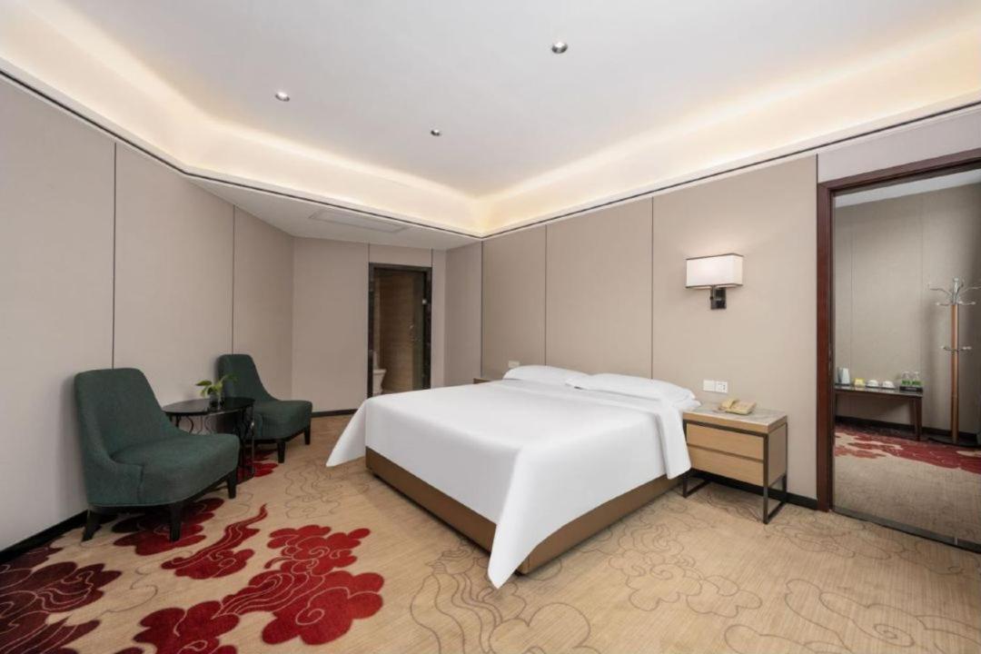 Mizparton Hotel South Qianjin Road Heshan  Bagian luar foto