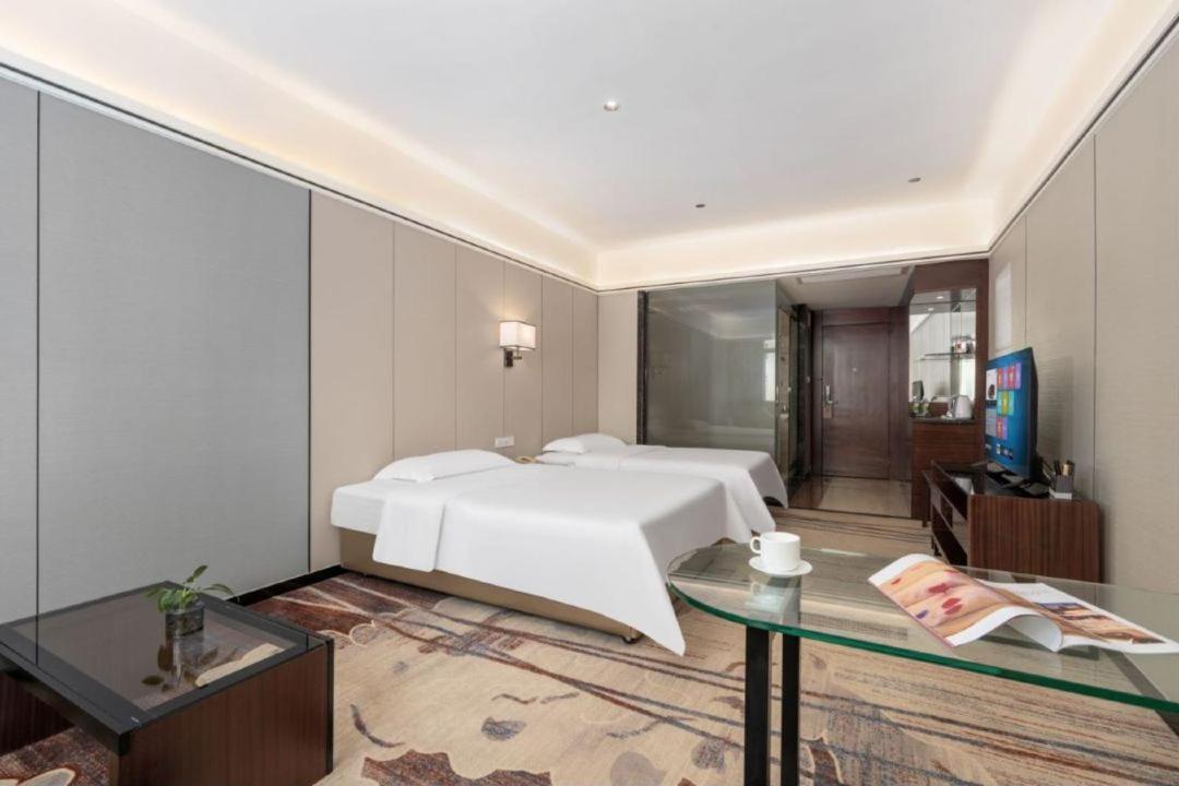 Mizparton Hotel South Qianjin Road Heshan  Bagian luar foto