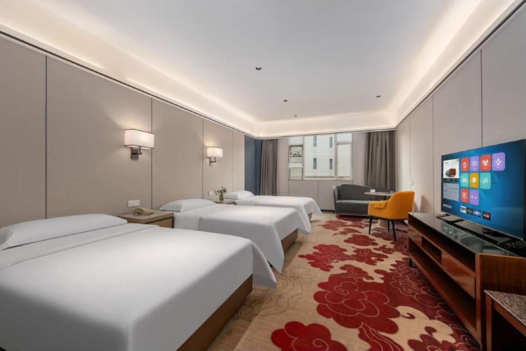Mizparton Hotel South Qianjin Road Heshan  Bagian luar foto