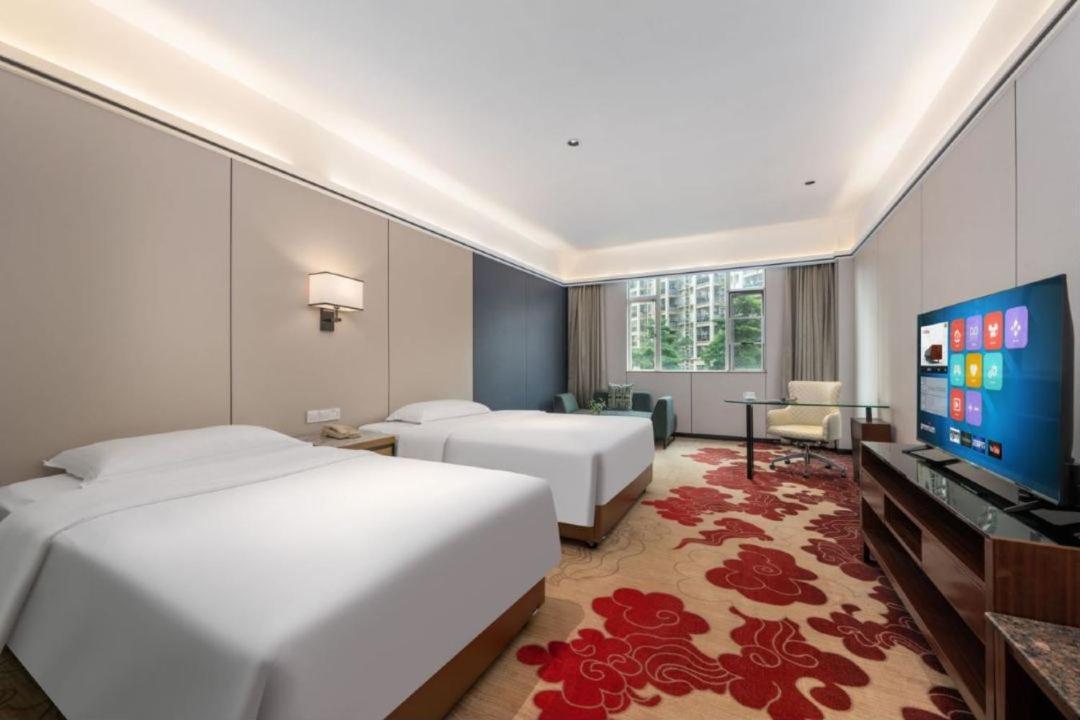 Mizparton Hotel South Qianjin Road Heshan  Bagian luar foto